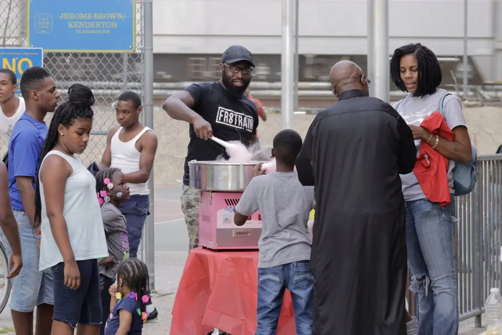 Neighbors gathering at a community wellness event